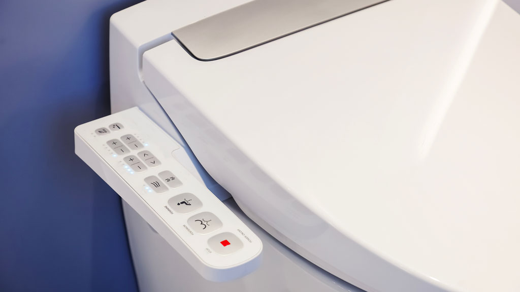 Panneau de commande WC japonais avec fonctionnalités de réglage